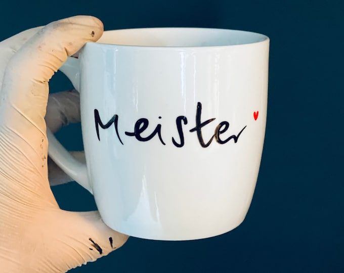 Mug with the lettering Meister