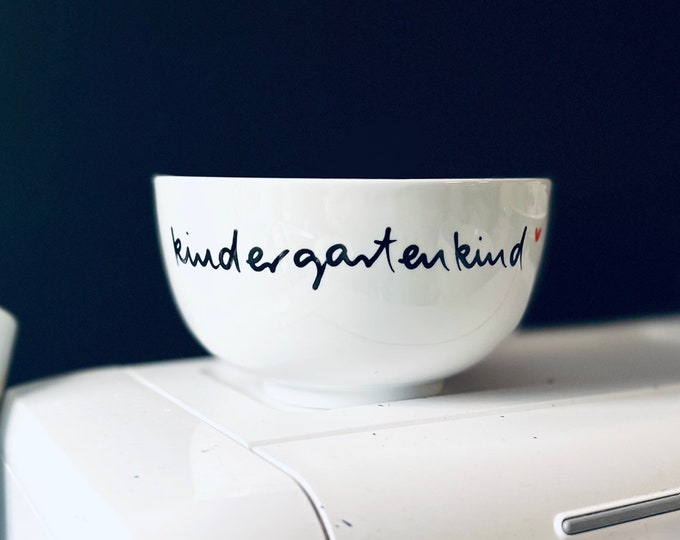 cereal bowl with kindergarten child