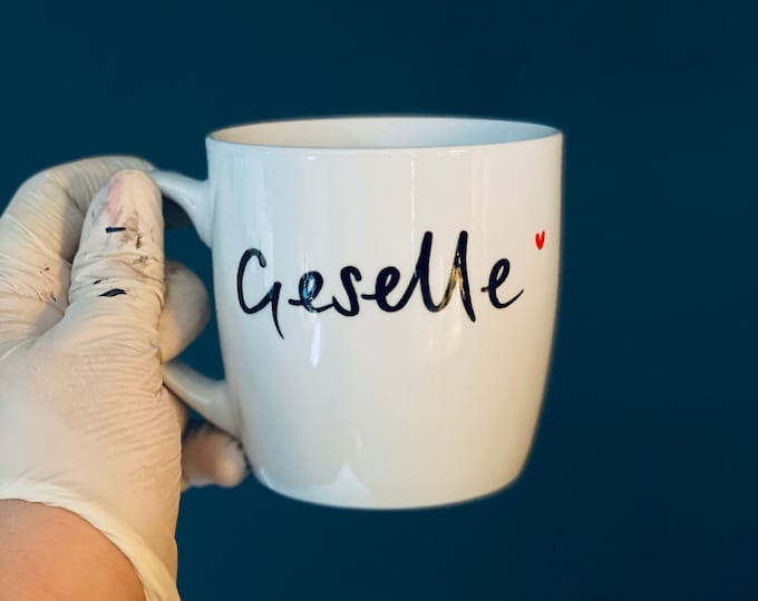 Cup with the lettering “Geselle”