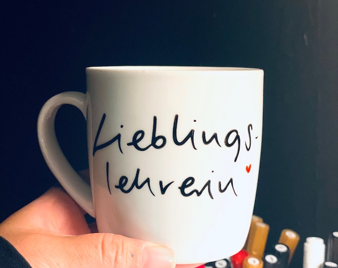Beautiful mug with the inscription Favorite Teacher, as a farewell gift for the teacher