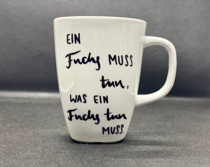 Mug with "a fox must do..."