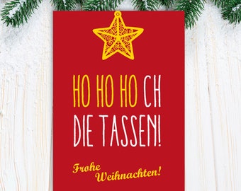 May include: A red Christmas card with a yellow star ornament and the text "Ho Ho Ho Ch Die Tassen! Frohe Weihnachten!"
