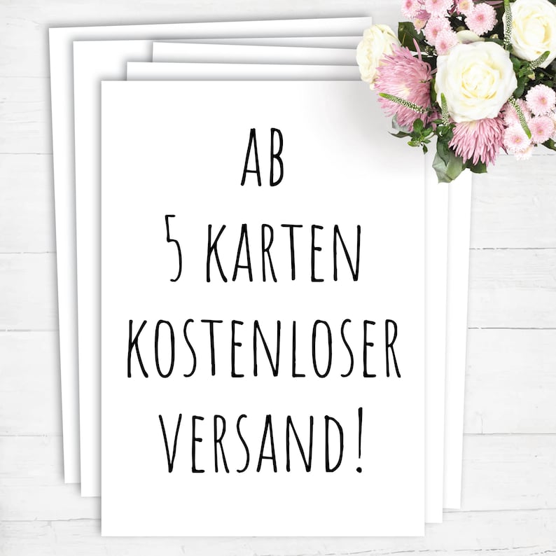 Op de afbeelding: Witte kaart met zwarte tekst die "AB 5 KARTEN KOSTENLOSER VERSAND!" zegt.