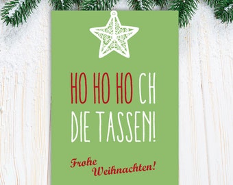 May include: Green Christmas card with a white star ornament and the text "Ho Ho Ho Ch Die Tassen!" in red and white. The card also has the text "Frohe Weihnachten!" in red.