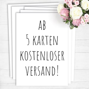 Peut inclure: Carte blanche avec du texte noir qui dit "AB 5 KARTEN KOSTENLOSER VERSAND!"