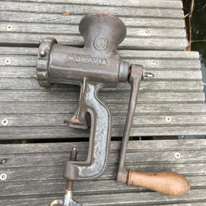 Antique vintage heavy cast iron meat grinder Moravia, Czechoslovakia, wooden handle, 1940s