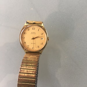 Męski zegarek na rękę Roma Quartz, vintage, antyczny, lata 60., 70., w kolorze złotym, datownik