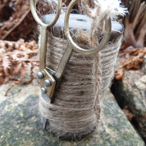 package tape, yarn roll, scissors,