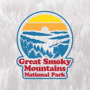 May include: A circular sticker featuring a stylized landscape of the Great Smoky Mountains National Park. The design includes a yellow and orange sunset, blue mountains and trees, and a bear silhouette. The text "Great Smoky Mountains National Park" is in red and white.