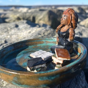 Beauty with books ceramic ash tray