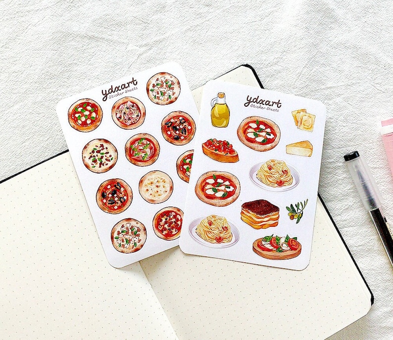 May include: Two sticker sheets with illustrations of Italian food. The first sheet features 12 different pizza designs. The second sheet features 8 designs including pizza, pasta, tiramisu, and a caprese salad.