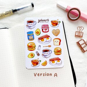May include: A sheet of stickers featuring a variety of breakfast foods, including coffee, eggs, bacon, toast, bagels, and avocado. The stickers are on a white background with the text "ydxart sticker sheets" in the top center.