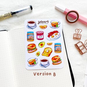 May include: A sheet of stickers featuring various breakfast foods, including a bagel sandwich, toast, eggs, bacon, peanut butter, jam, and coffee. The stickers are illustrated in a watercolor style and are perfect for adding a touch of whimsy to your planner or journal.