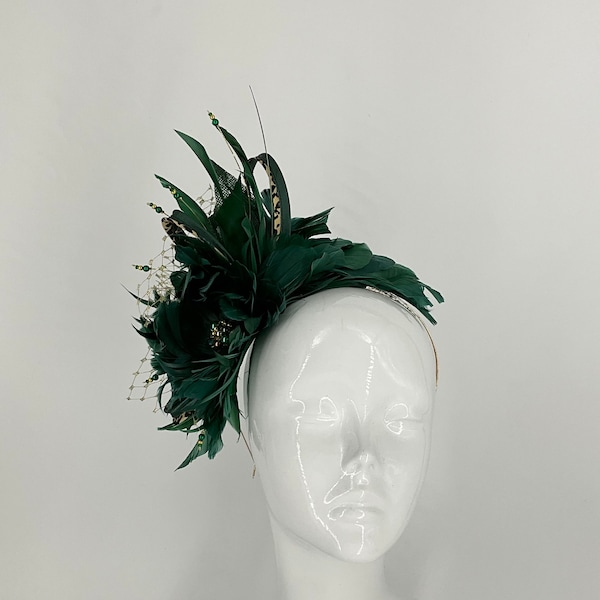 Emerald, leopard print and gold birdcage veiling feather fascinator