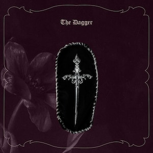 May include: An illustration of a dagger with intricate silver detailing on a black background. The text "The Dagger" is displayed at the top. The image has a gothic or fantasy theme, with a dark purple floral element.