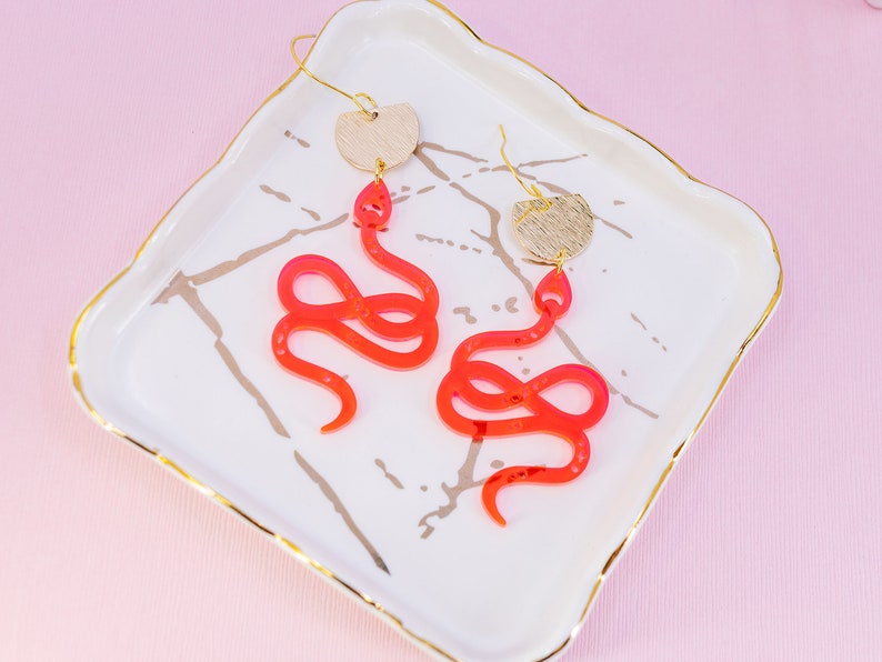 Fluorescent Snake Earrings with Gold Accents", "Fun and Quirky Earrings", "Summer Novelty Earrings