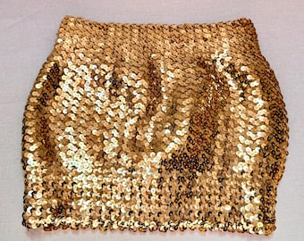 Top retro de tubo con lentejuelas doradas, estilo disco de los años 80, forrado. En excelente estado.