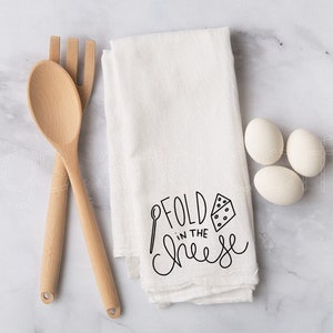 Fold in the cheese flour sack towel