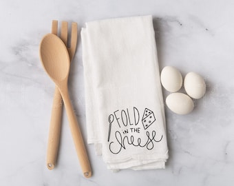 Fold in the cheese flour sack towel