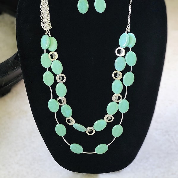 Laverne- is a beautiful two-stranded faux turquoise and silverplated necklace set with an accent chain.   It's a great gift idea for her.