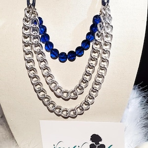 Blue and silver necklace- Just Jewels Designs&#39; brushed silver chain with royal blue beads on a chord.