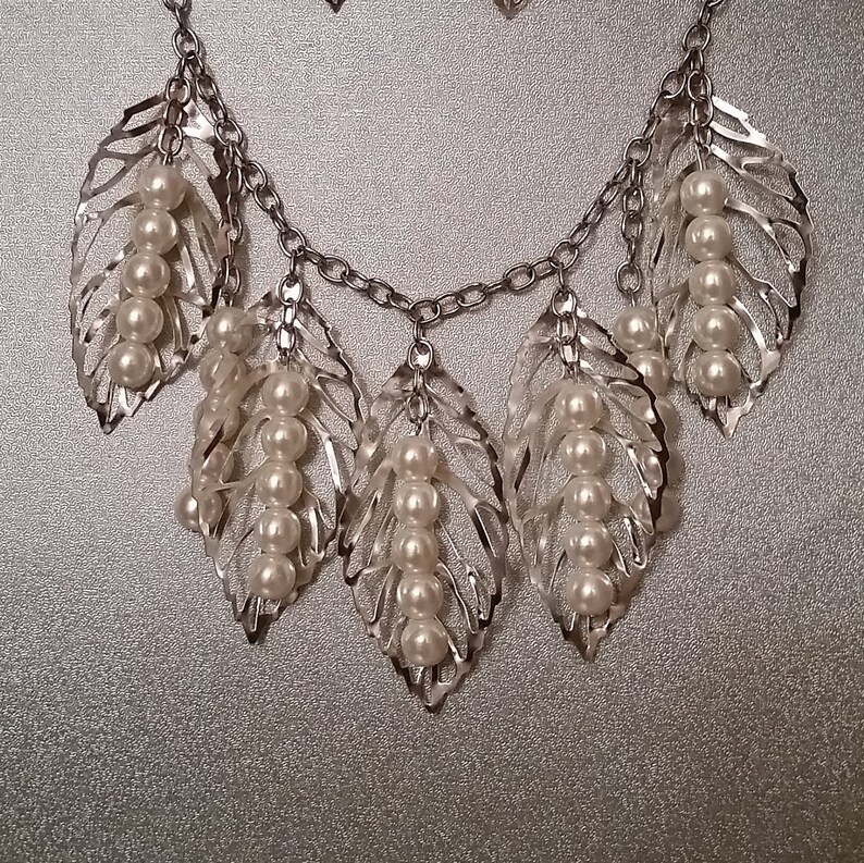Silver Pearly Wrap by Just Jewel Designs by RM is a gorgeous large filigree leaves necklace set with small filigree earring with faux pearls