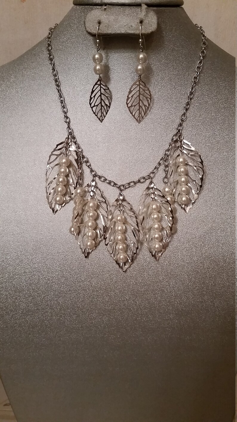 Silver Pearly Wrap by Just Jewel Designs by RM is a gorgeous large filigree leaves necklace set with small filigree earring with faux pearls