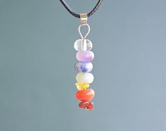 7 Chakra Stone Pendant Necklace: Seven Chakra Gemstones on Black Cord