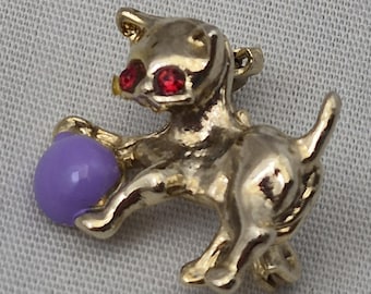 Tiny gold tone cat kitty pin creepy red eyes lavender cabochon ball brooch .5 x .75 inch