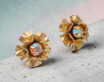 Gold tone figural flower with an AB center rhinestone clip on earrings ear clips .75 inch