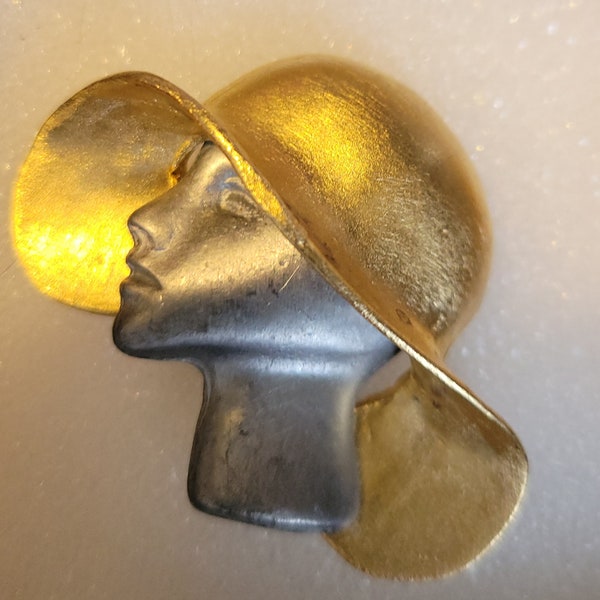 Vintage jewelry gold tone and pewter Ultra craft signed lady in hat pi. Brooch