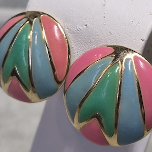 May include: A set of three ceramic mugs with a speckled, matte finish. The mugs are in shades of cream, light gray, and dark gray. Each mug has a simple, minimalist design, perfect for coffee or tea.