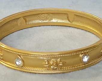 Large 1980s Elizabeth Taylor for Avon &quot;love blooms&quot; satin gold tone rhinestone bangle bracelet 10 inch around 3 inches across