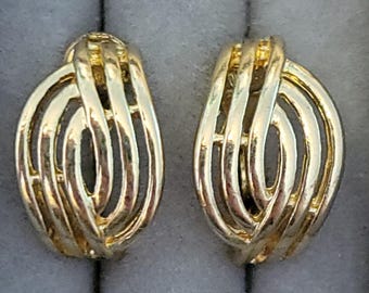 Small open work gold tone clip on earrings ear clips