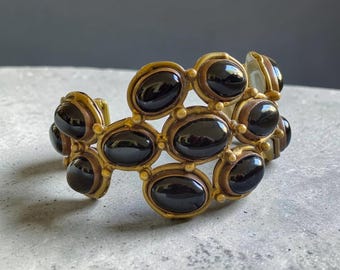 Striking vintage Artisan brass copper 13 black onyx cabochons hefty cuff bracelet 7.5 inch +/- 2.1 inch wide