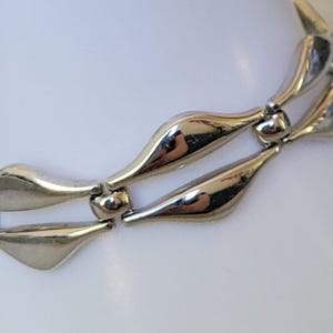 Monet 7 inch silver tone link bracelet safety chain