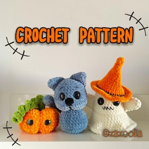 May include: Image of a crochet pattern showing three handmade plush toys: a blue bear, a white ghost with an orange witch hat, and an orange pumpkin with green leaves. The words "CROCHET PATTERN" are in orange.