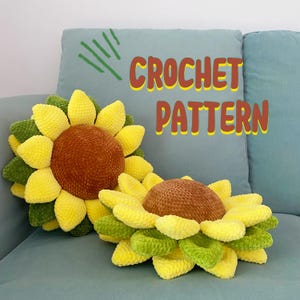 May include: Two sunflower-shaped crochet pillows with yellow, green, and brown details. The pillows are on a light blue couch. The text "CROCHET PATTERN" is displayed in the upper right corner.
