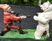 cast iron hand painted bear and hunter bank Banker