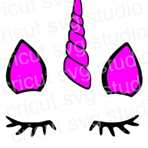 May include: A pink unicorn face with closed eyes and a curled horn. The unicorn's eyes are black and the horn is pink.