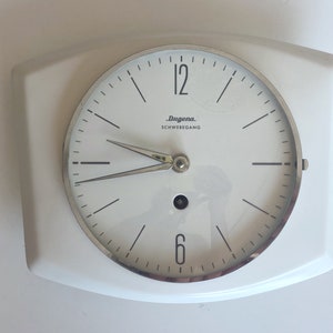 Dugena porslinsväggklocka, köksklocka, 1950-tal, svävande design