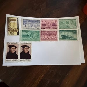 Stamps affixed:  100 Postcards to Voters Blank Cards
