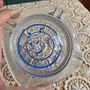 Vintage Reddy Kilowatt Glass Ash Tray Blue  Vintage Ashtrays Electrical Mascot Vintage | Metropolitan Edison Employees Association | Chipped