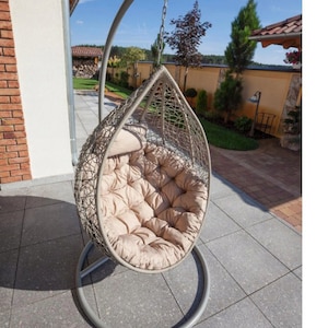Schuster wicker hanging egg double swing chair with stand top