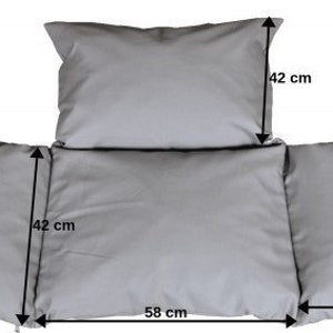 May include: Three gray cushions with measurements in centimeters. The largest cushion is 58 cm wide, 42 cm tall, and 42 cm deep. The two smaller cushions are 50 cm wide and 35 cm wide.