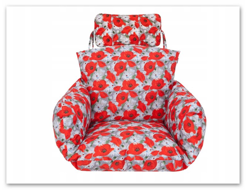 May include: Red and white floral chair cushion with a matching headrest. The cushion has a poppy and daisy print.