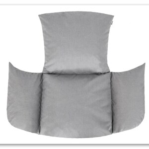 May include: A grey, three-piece cushion set for a swing chair. The set includes a back cushion and two armrest cushions.