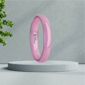 May include: A pink ceramic ring with the words "PINK CERAMIC" engraved on the side.