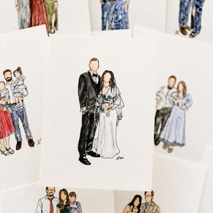May include: A collection of watercolor illustrations on white paper featuring various couples and families. The central artwork depicts a wedding couple with the person on the left in a black suit and the person on the right in a white gown holding a bouquet.