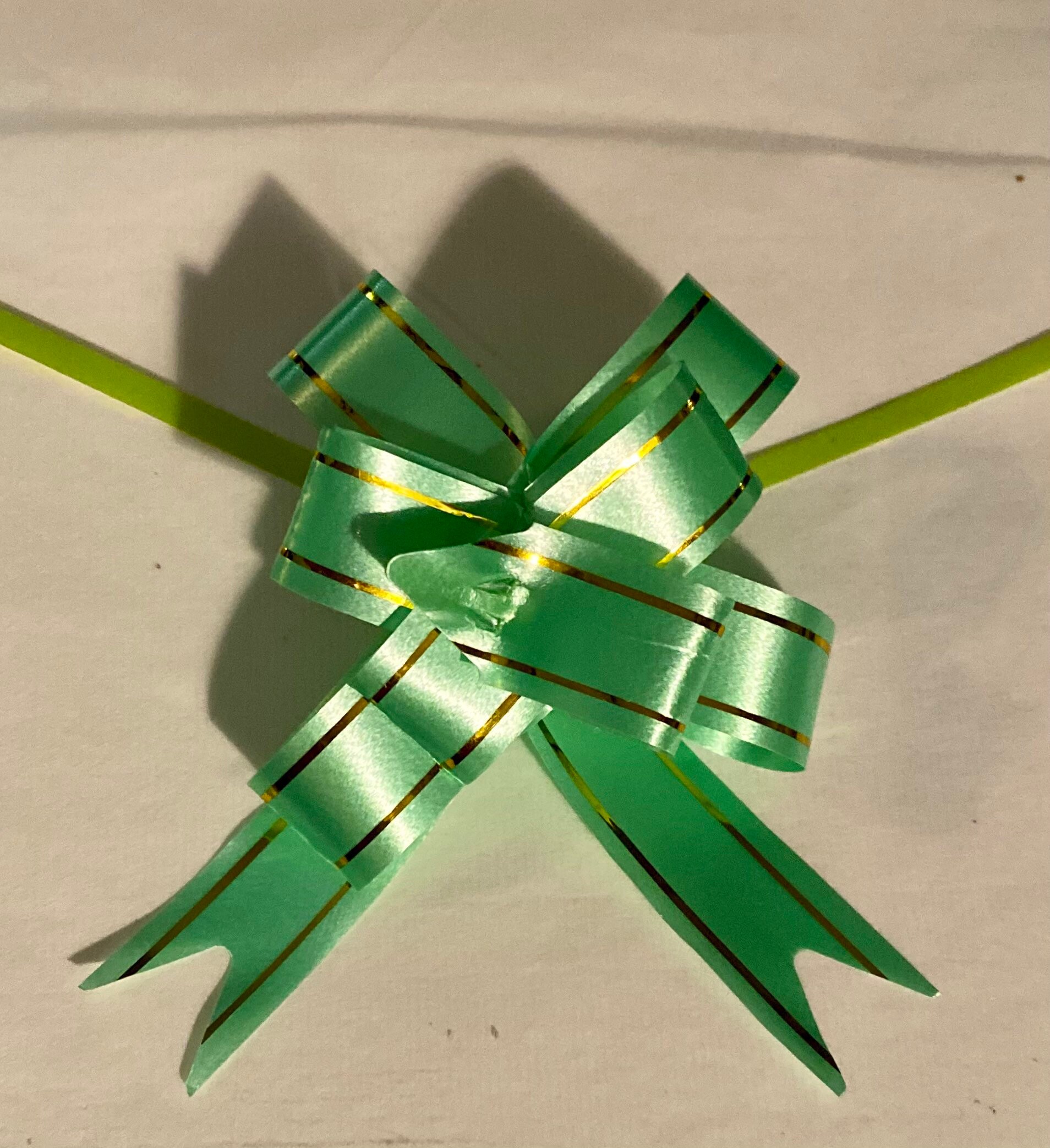 Pull string bows that can be reused or made flat again & Etsy